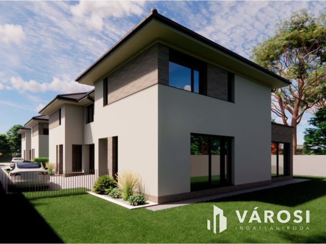 Debrecen csendes kertvárosi részén ELADÓ IKERHÁZ